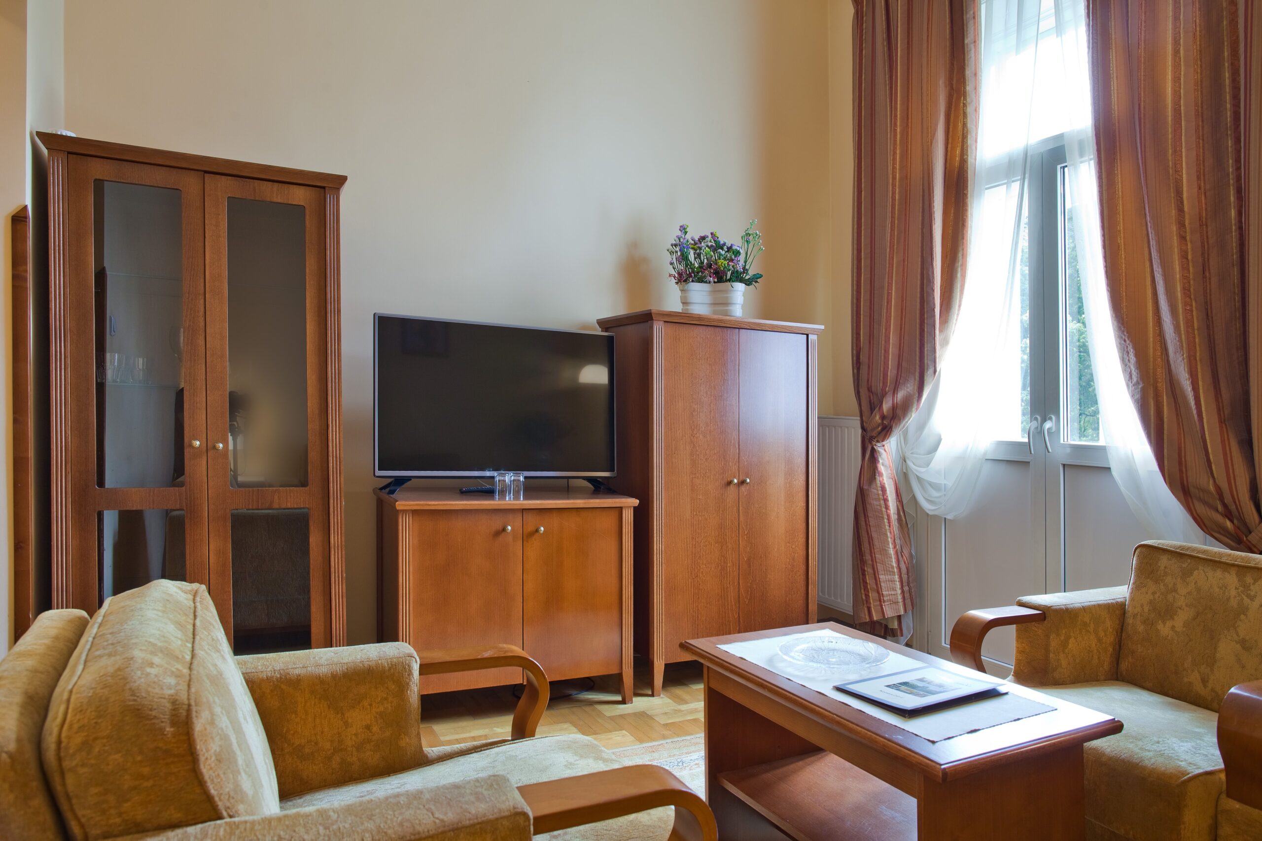 Pokój dzienny w apartamencie deluxe